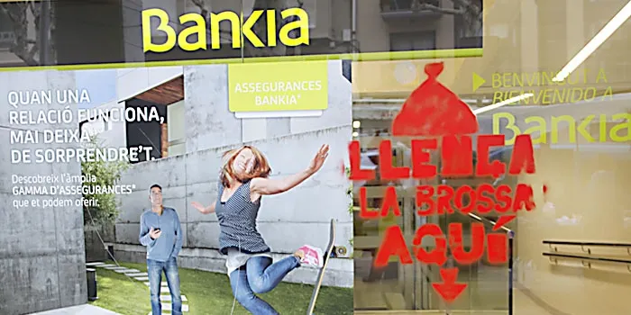 Apareixen pintades a les entitats financeres que diuen: "Llença la brossa aquí"