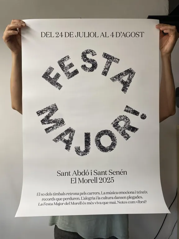 El repic dels timbals de l'Embruix, imatge del programa de festa major
