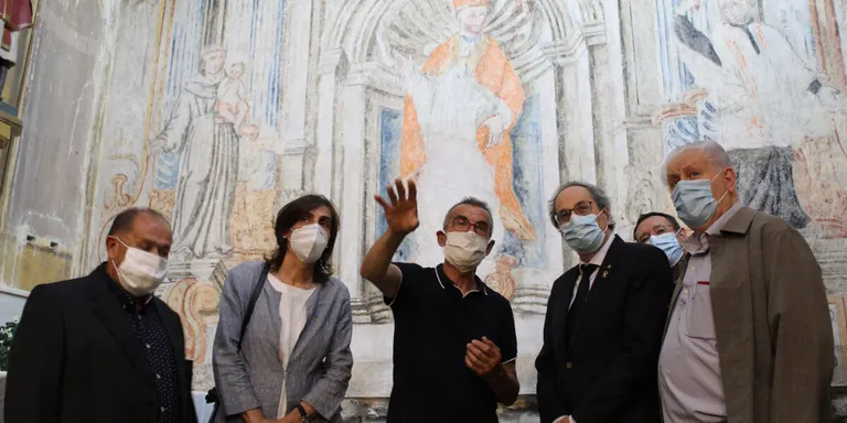 Torra visita les pintures barroques de Butsènit i inaugura el Pla de Barris de Montgai