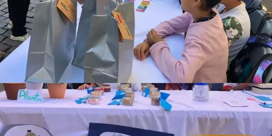 Alumnes de 5è de Primària d'El Calderí venen al mercat setmanal els productes creats des de la seva cooperativa escolar