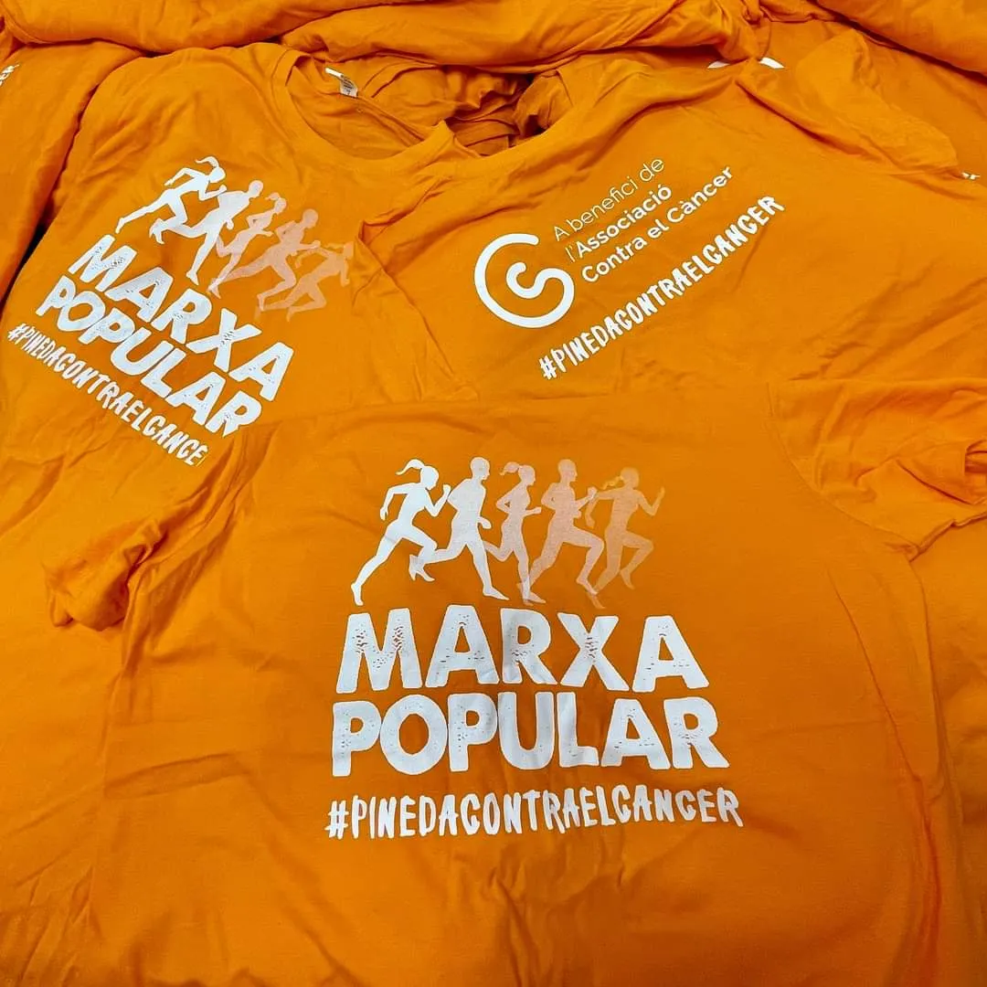 Marxa Popular Lluita contra el Càncer de Pineda: samarretes i tiquets a la venda a la pl. de les Mèlies i Centre Cívic Poblenou