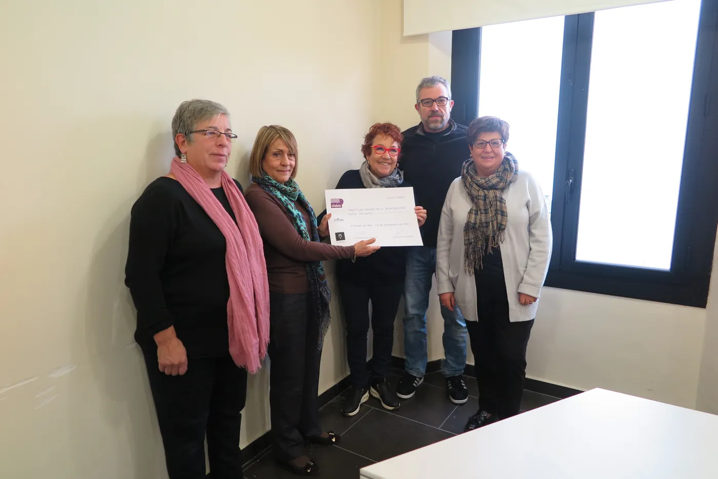 Viladona lliura 600 euros a la fundació AGI